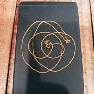 Real 18k thin yellow gold chain, 18" long, new, stamped. Beautiful!